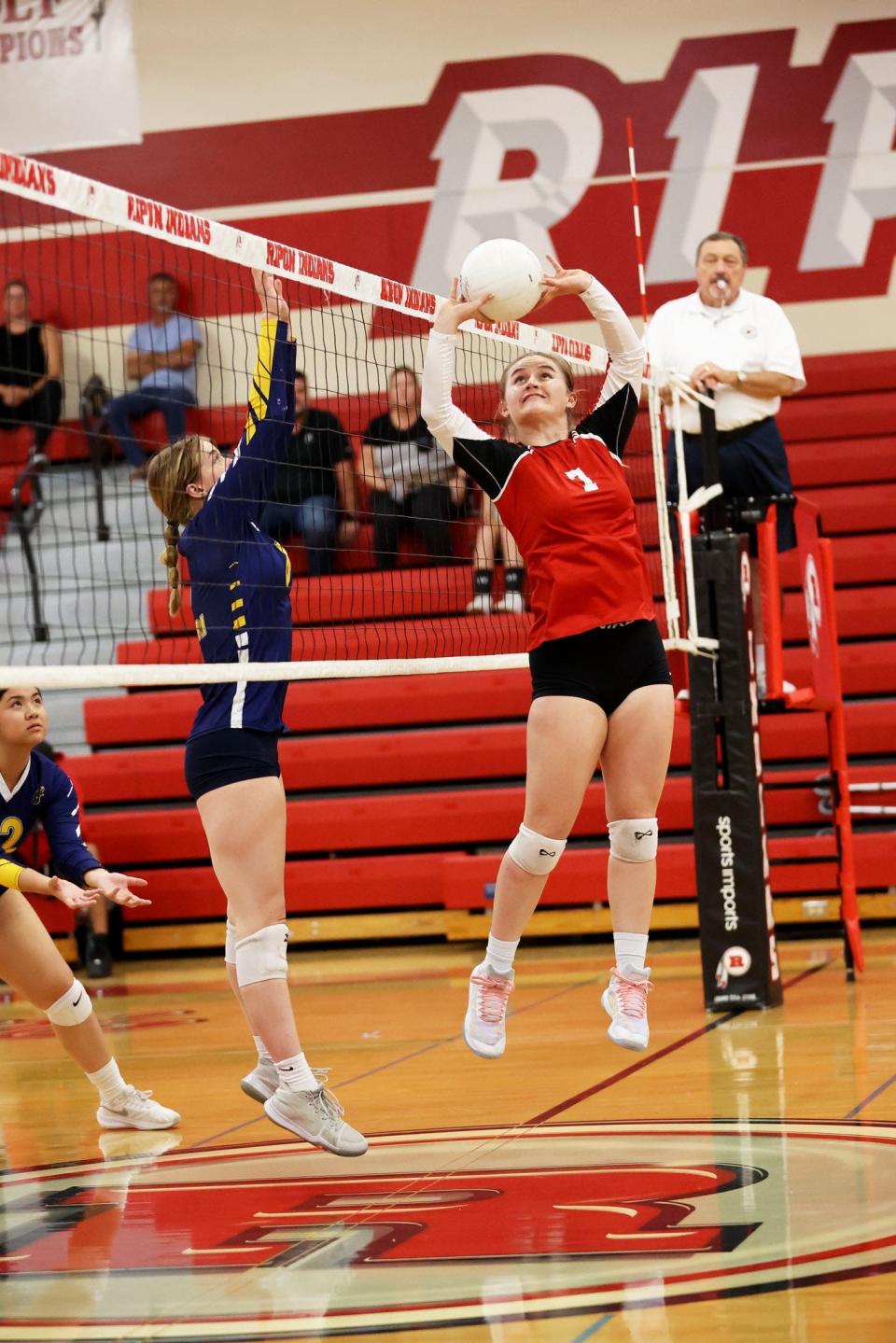 Kaya Whittaker of Ripon girls volleyball sets the volleyball during one of the Indians matches in the 2023-24 season.