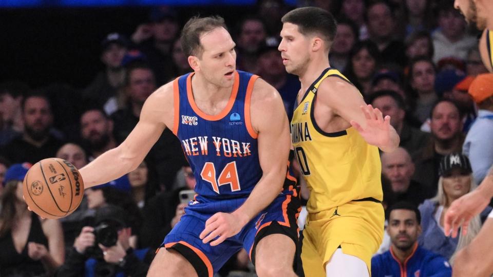 New York Knicks forward Bojan Bogdanovic (44) posts up against Indiana Pacers forward Doug McDermott (20) during the second quarter at Madison Square Garden.