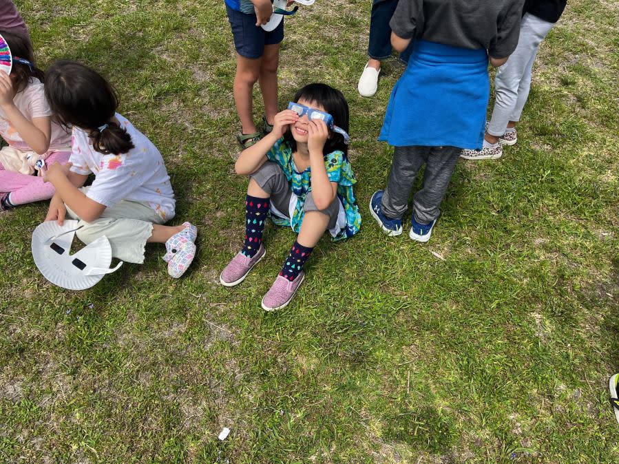 Kids at Reilly Elementary School in Austin, Texas, watch the total solar eclipse. (KXAN Photo/Kelly Wiley)