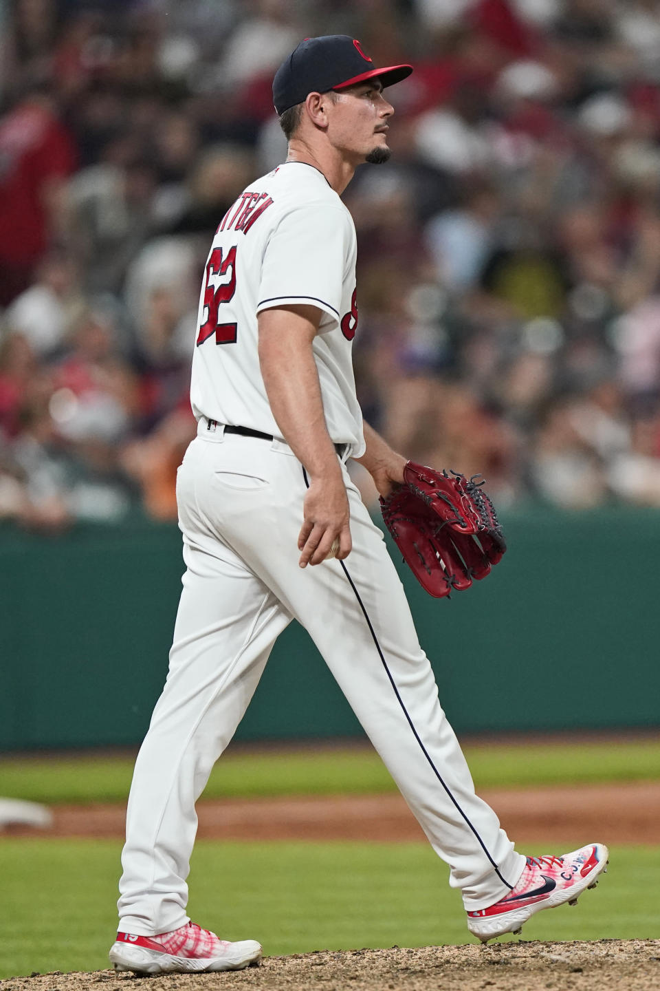 Cleveland Indians relief pitcher Nick Wittgren waits for Tampa Bay Rays' Ji-Man Choi to run the bases on a three-run home run in the ninth inning of a baseball game Friday, July 23, 2021, in Cleveland. (AP Photo/Tony Dejak)