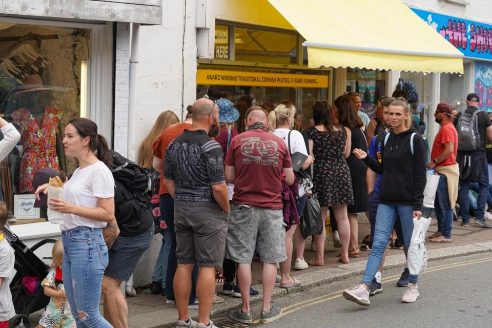 The scene in the summer is often in contrast to the winter when businesses and restaurants close (Getty Images)