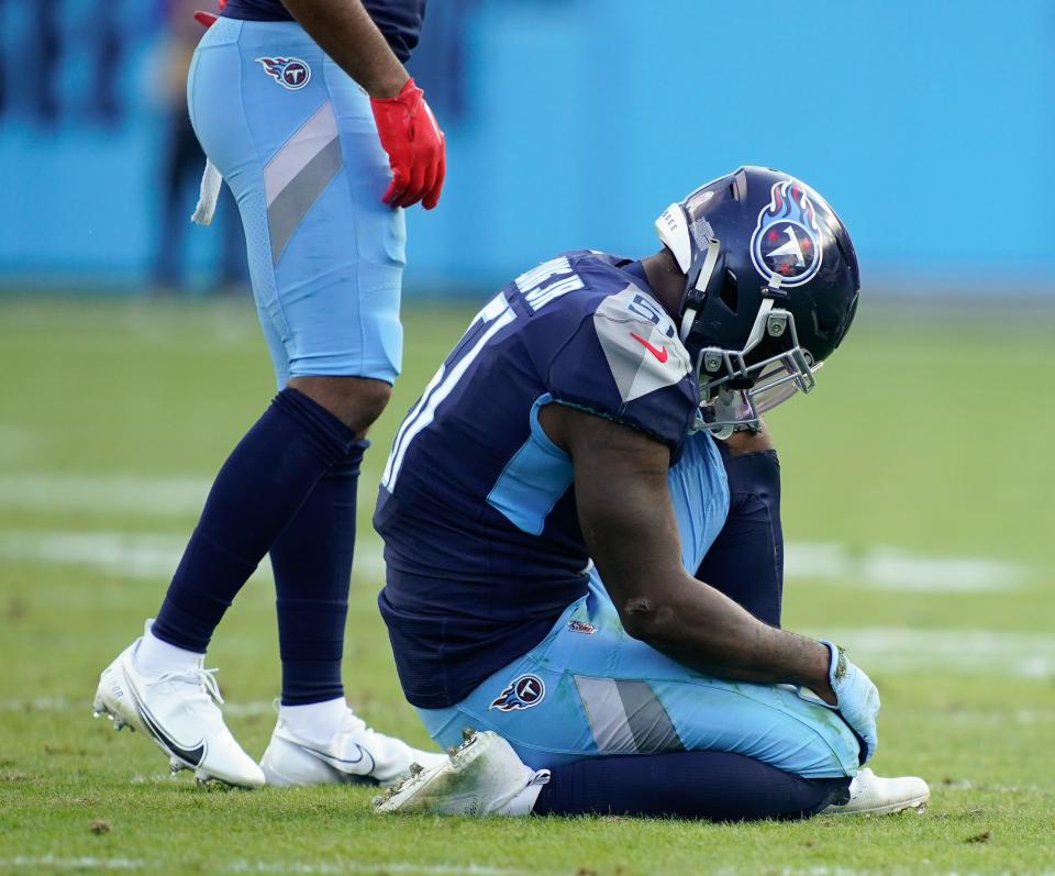 Tennessee Titans linebacker David Long Jr. (51) sits on the ground after getting injured during the fourth quarter at Nissan Stadium Sunday, Nov. 13, 2022, in Nashville, Tenn. 