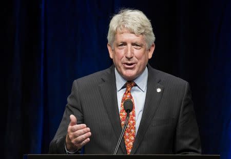 FILE PHOTO: Virginia Attorney General Mark Herring speaks at the Virginia Democratic Party's annual Jefferson-Jackson party fundraising dinner at George Mason University in Fairfax, Virginia, U.S. June 26, 2015. REUTERS/Joshua Roberts/File Photo