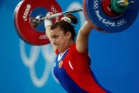 Nadezda Evstyukhina of Russia competes in the women's 75kg Group A weightlifting snatch competition at the Beijing 2008 Olympic Games August 15, 2008. REUTERS/Yves Herman