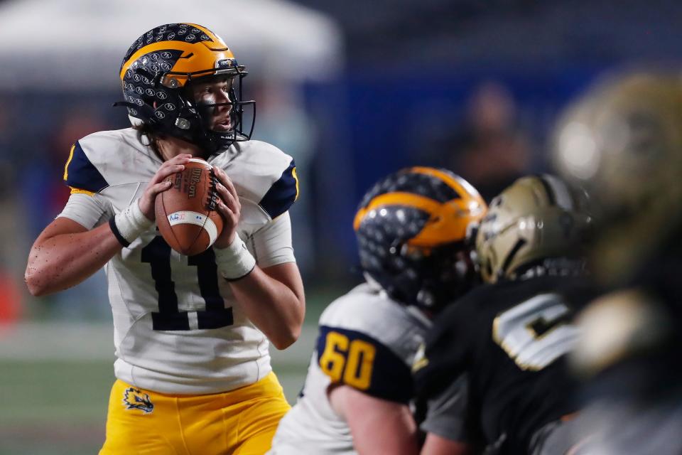 Prince Avenue's Aaron Philo (11) looks to pass during the GHSA high school football Class A Division 1 state championship game between Swainsboro and Prince Avenue in Atlanta, on Thursday, Dec. 8, 2022. Prince Avenue won 52-34.