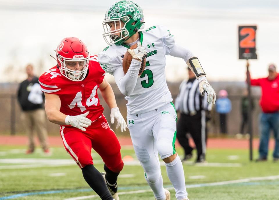 Tyson Totten, shown here during the Section V Football 8-man final, rushed for six touchdowns during Pembroke's win during the state tournament regional round.