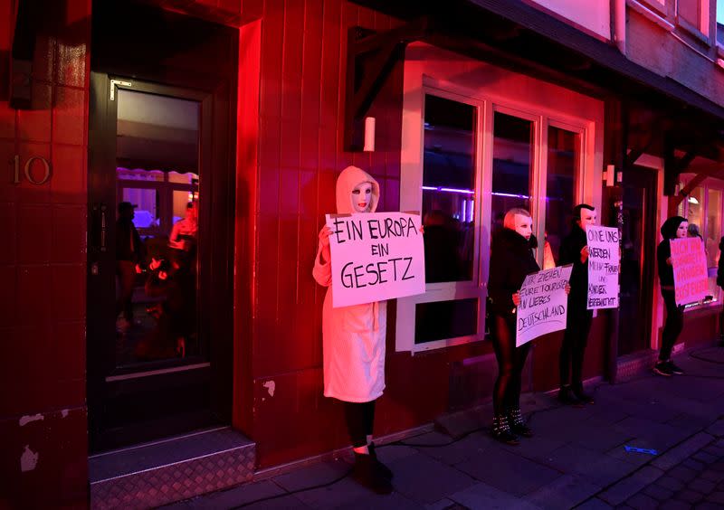 Prostitutes hold a rally in Hamburg demanding the reopening of Germany's brothels