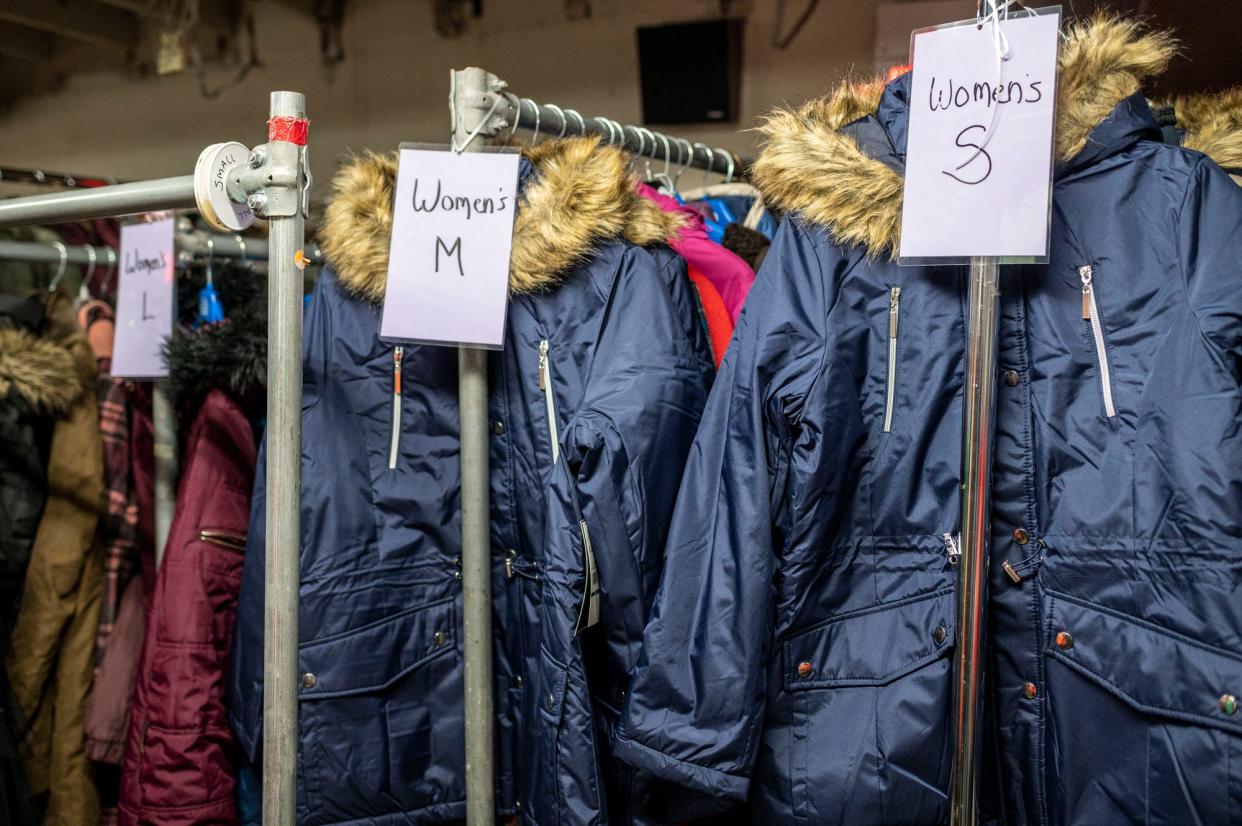 In this Oct. 19, 2021 photo, Coats are available for free to families in need at Charitable Union in Battle Creek, Michigan.