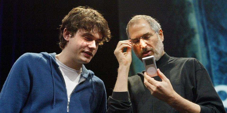 John Mayer and Steve Jobs on stage in 2004 introducing GarageBand.