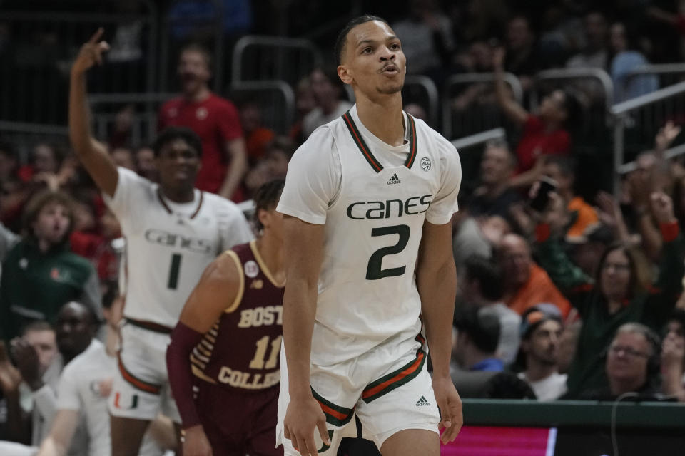 Miami guard Isaiah Wong (2) gestures after scoring a three point basket during the second half of an NCAA college basketball game against the Boston College, Wednesday, Jan. 11, 2023, in Coral Gables, Fla. (AP Photo/Marta Lavandier)