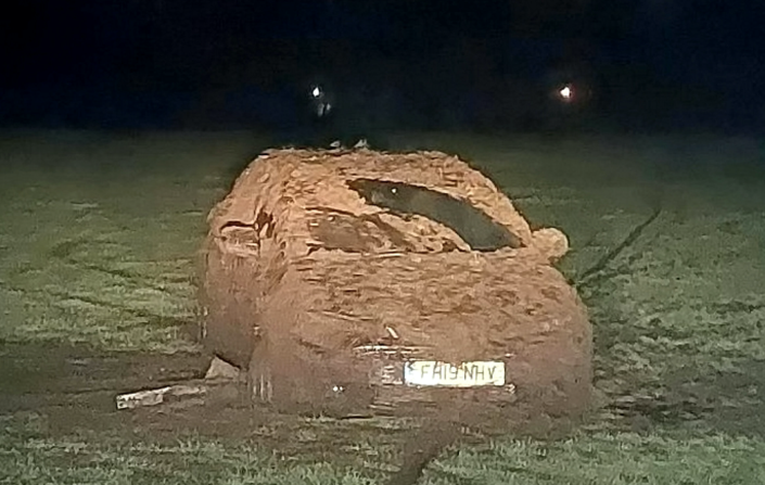 The Toyota Corolla was utterly covered in dirt and mud. (SWNS)