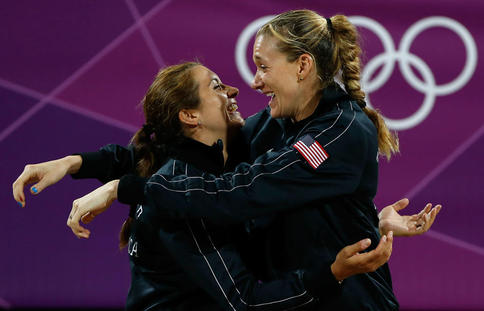 <b>Women's beach volleyball</b><br>Gold medalists Misty May-Treanor and Kerri Walsh Jennings celebrate during the women's beach volleyball medal ceremony at the London Games. May-Treanor and Walsh have won three straight gold medals in the event for the U.S., dating back to the 2004 Athens Olympics. (Photo by Jamie Squire/Getty Images)