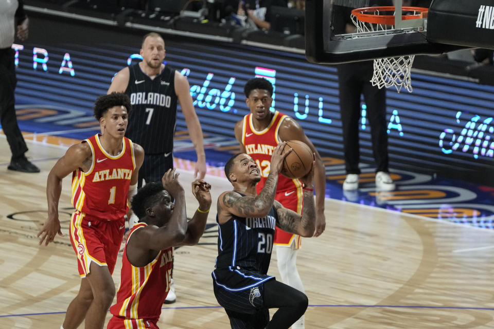 Orlando Magic's Markelle Fultz aims to shoot against Atlanta Hawks' Clint Capela, during the first half of an NBA basketball game, at the Mexico Arena in Mexico City, Thursday, Nov. 9, 2023. (AP Photo/Eduardo Verdugo)