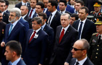 Turkish President Tayyip Erdogan (2nd R), Chief of Staff General Hulusi Akar (R) and Prime Minister Ahmet Davutoglu (2nd L) arrive a funeral ceremony for Army officer Seckin Cil in Ankara, Turkey, February 18, 2016. REUTERS/Umit Bektas/File Photo