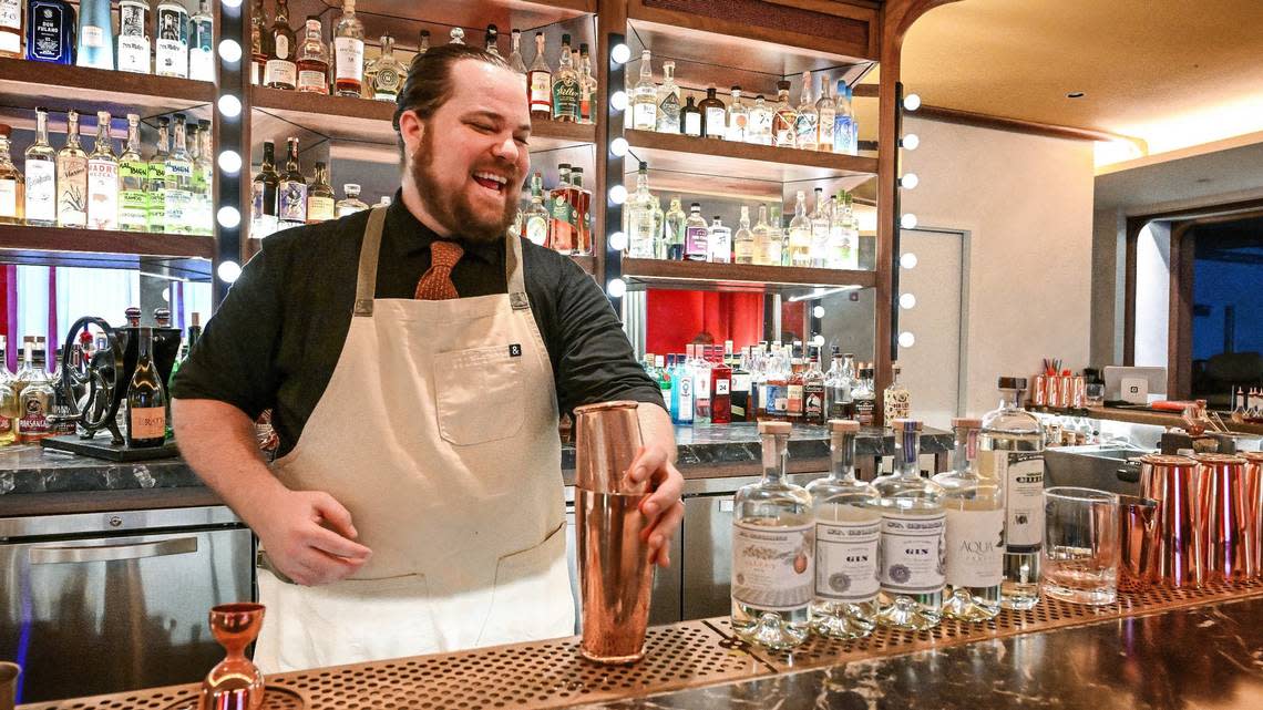 Ryan Metcalf, beverage director at The Red Room cocktail bar located inside Pardini’s in Fresno, prepares a cocktail made with Valley Gin from St. George Spirits.