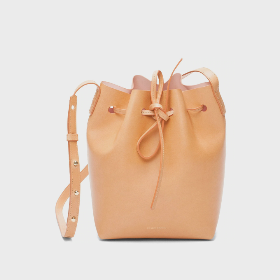 <p><strong>Mansur Gavriel</strong></p><p>mansurgavriel.com</p><p><strong>$595.00</strong></p><p><a href="https://go.redirectingat.com?id=74968X1596630&url=https%3A%2F%2Fwww.mansurgavriel.com%2Fproducts%2Fcammello-mini-bucket-bag-rosa&sref=https%3A%2F%2Fwww.cosmopolitan.com%2Fstyle-beauty%2Ffashion%2Fg37640984%2Fspring-2022-bag-trends%2F" rel="nofollow noopener" target="_blank" data-ylk="slk:Shop Now;elm:context_link;itc:0;sec:content-canvas" class="link ">Shop Now</a></p><p>A lighter color purse will brighten up any spring time outfit. </p>