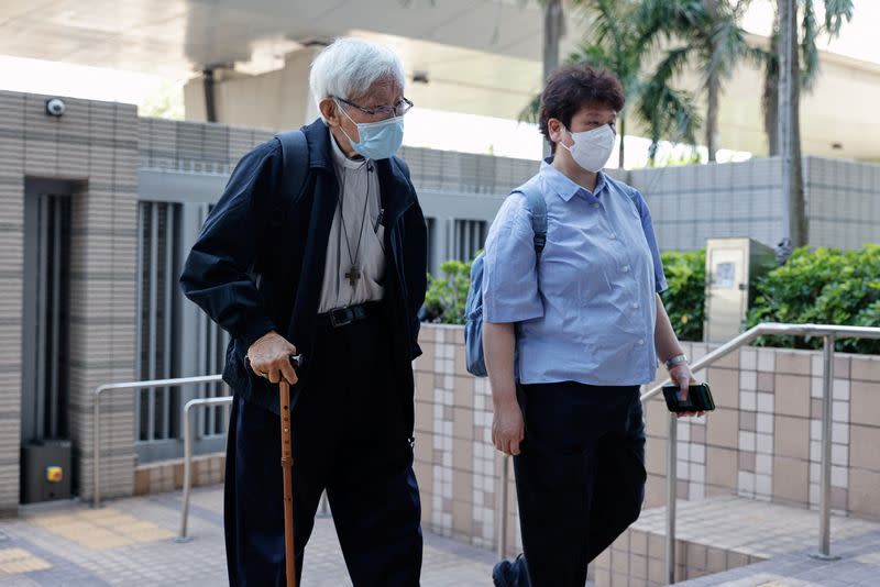 Retired bishop Cardinal Joseph Zen Ze-kiun arrives at the West Kowloon Magistrates' courts for allegedly failing to register the legal and medical fund that helped those embroiled in the 2019 anti-government protests as a society, in Hong Kong