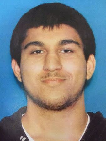 Arcan Cetin, 20, of Oak Harbor is seen in a Washington State Department of Licensing photo released by the Washington State Patrol after they named him as a suspect in a mass shooting in Burlington, Washington, U.S. September 24, 2016. Washington State Patrol/Handout via Reuters.