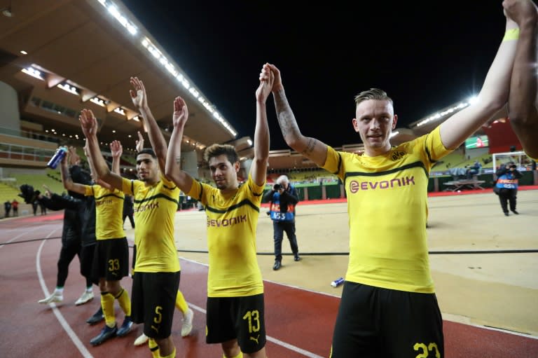 Borussia Dortmund celebrate Tuesday's 2-0 win at Monaco, which confirmed their Champions League, last 16 place as group winners, but coach Lucien Favre is expected to make numerous changes on Saturday for the Bundesliga leaders against Werder Bremen