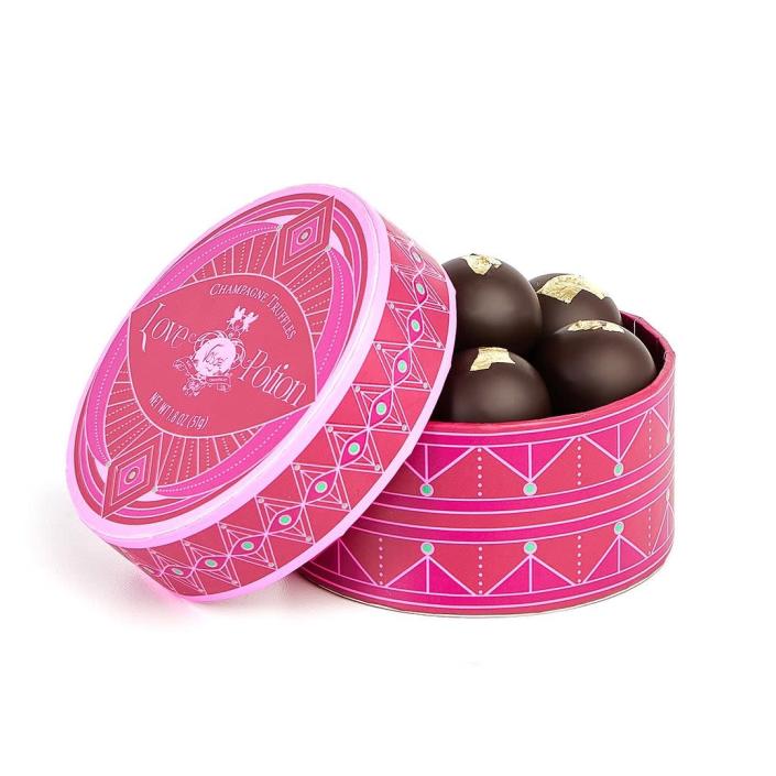 <h2>Vosges Chocolate</h2><br><a href="https://www.vosgeschocolate.com/" rel="nofollow noopener" target="_blank" data-ylk="slk:Vosges" class="link ">Vosges</a> website states: "We are on an everlasting quest for ingredients at the pinnacle of their taste profile, making it our mission to carefully select the finest ingredients Mother Nature and our farmer and artisan partners have to offer." And that's exactly what they do with their luxe truffle collections, <a href="https://www.vosgeschocolate.com/pages/chocolate-bars" rel="nofollow noopener" target="_blank" data-ylk="slk:chocolate bar gift sets," class="link ">chocolate bar gift sets,</a> and <a href="https://www.vosgeschocolate.com/collections/gifts-under-25/products/northwoods-cranberry-pecan-toffee" rel="nofollow noopener" target="_blank" data-ylk="slk:Northwoods Cranberry Pecan Toffee" class="link ">Northwoods Cranberry Pecan Toffee</a>. <br><br>Shop <strong><a href="https://www.vosgeschocolate.com/collections/a-love-eternal-chocolate-collection" rel="nofollow noopener" target="_blank" data-ylk="slk:Vosges Chocolates" class="link ">Vosges Chocolates</a></strong><br><br><strong>Vosges</strong> Love Potion Champagne Truffles, $, available at <a href="https://go.skimresources.com/?id=30283X879131&url=https%3A%2F%2Fwww.vosgeschocolate.com%2Fcollections%2Fa-love-eternal-chocolate-collection%2Fproducts%2Flove-potion-champagne-truffles" rel="nofollow noopener" target="_blank" data-ylk="slk:Vosges" class="link ">Vosges</a>