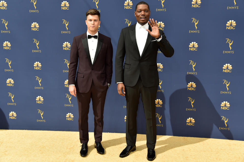 Hosts Colin Jost and Michael Che arrive at the 70th Emmy Awards on Sept. 17.