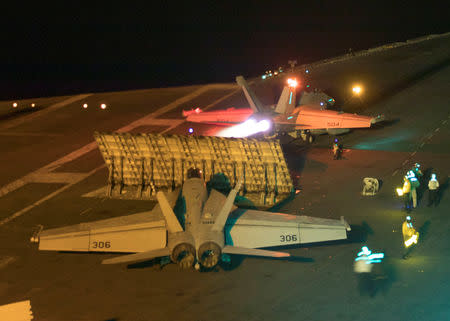 FILE PHOTO: An F/A-18E Super Hornet launches from the flight deck of the Nimitz-class aircraft carrier USS Abraham Lincoln in the Red Sea, May 10, 2019. Courtesy Dan Snow/U.S. Navy/Handout via REUTERS