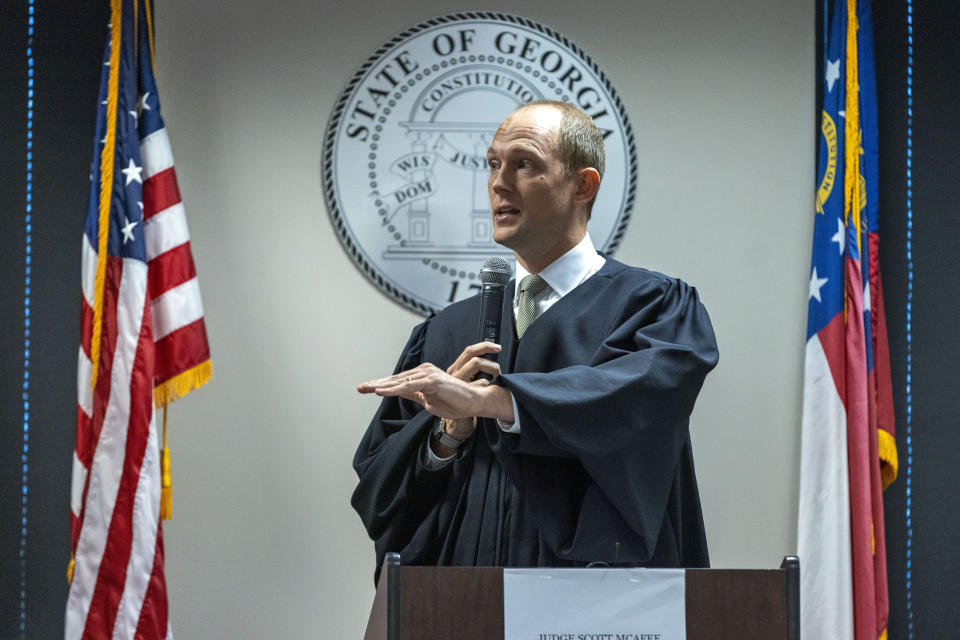 Fulton Superior Court Judge Scott McAfee addresses potential jurors during jury selection for lawyer Kenneth Chesebro's trial, Friday, Oct. 20, 2023, at the Fulton County Courthouse in Atlanta. Jury selection began Friday for Chesebro, the first defendant to go to trial in the Georgia case that accuses former President Donald Trump and others of illegally scheming to overturn the 2020 election in the state. (Alyssa Pointer/Pool Photo via AP)