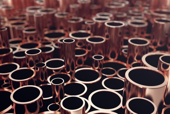 Various sizes of copper pipes stacked together