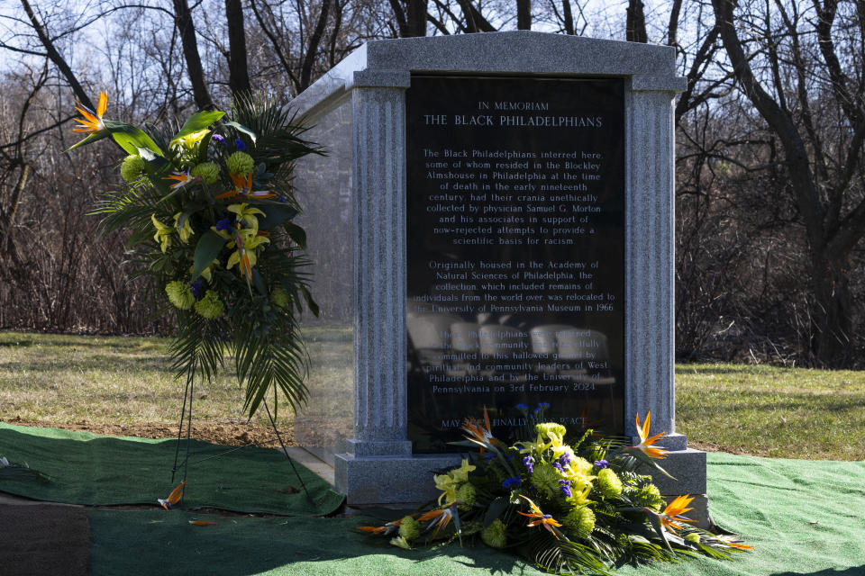 University of Pennsylvania's Penn Museum hosts an interfaith burial service for 19 unidentified Black Philadelphians whose remains were part of a museum display, at Eden Cemetery on Saturday, Feb. 3, 2024, in Collingdale, Pa. As part of a growing effort among museums to reevaluate the curation of human remains, the Ivy League school laid some of the remains to rest last week. (AP Photo/Joe Lamberti)