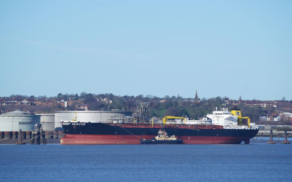 The German flagged Seacod oil tanker which is moored at Birkenhead Docks near the Stanlow Oil Refinery. Picture date: Saturday March 5, 2022. PA Photo. Workers are refusing to deal with the ship carrying Russian oil which is moored in the UK. Unions are urging the Government to close what they believe is a loophole following a ban on Russian vessels docking in the UK, because they say cargo is not covered. Unite said because the vessel is German flagged it doesnâ€™t come under the terms of the UKâ€™s ban on Russian shipping. See PA story POLITICS Ukraine Ships. Photo credit should read: Peter Byrne/PA Wire - Peter Byrne /PA