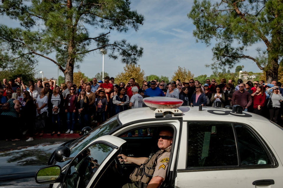 A police officer on patrol at the reunification center. | Hilary Swift