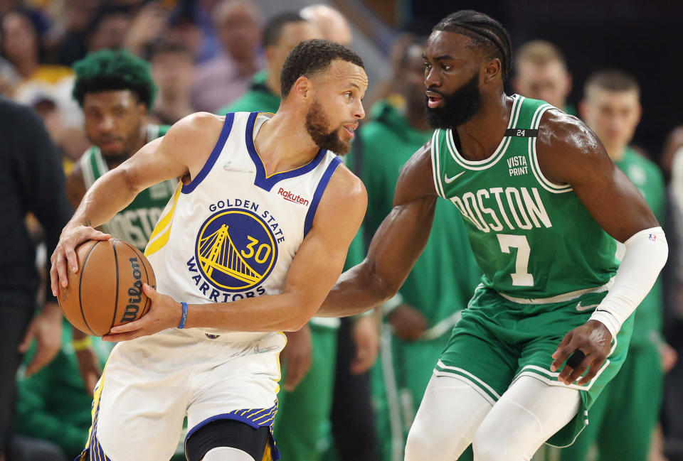 Boston Celtics guard Jaylen Brown defends Golden State Warriors guard Stephen Curry during Game 2 of the 2022 NBA Finals at Chase Center in San Francisco on June 5, 2022. (Ezra Shaw/Getty Images)