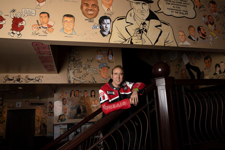 Actor Nicolas Cage unveils and signs his caricature at The Palm restaurant on April 3, 2024, in Los Angeles, California