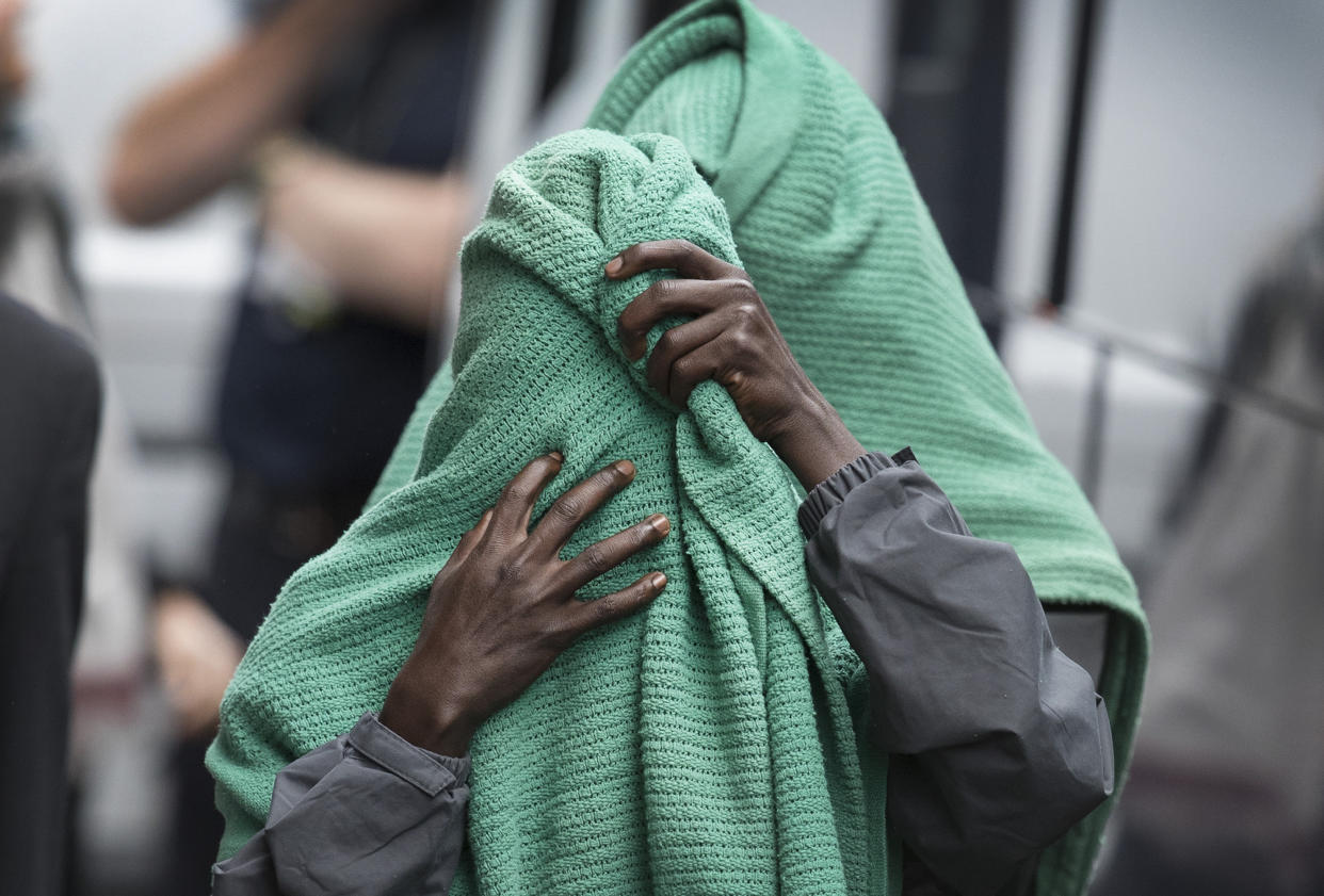 Asylum seekers arrive at the Home Office immigration centre in Croydon in October 2016 (Peter MacDiarmid/REX/Shutterstock)