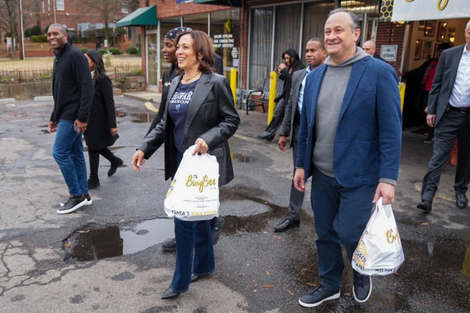 Vice President Kamala Harris and her husband, Doug Emhoff, leave The Busy Bee with their bags of soul food from the Black-owned restaurant in Atlanta. (Photo: Courtesy of the Office of the Vice President)