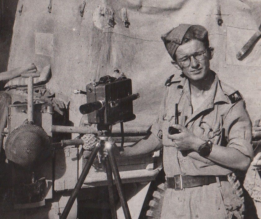 Sergeant Eddy 'Smiler' Smales with his cine camera - Courtesy Nigel Smales
