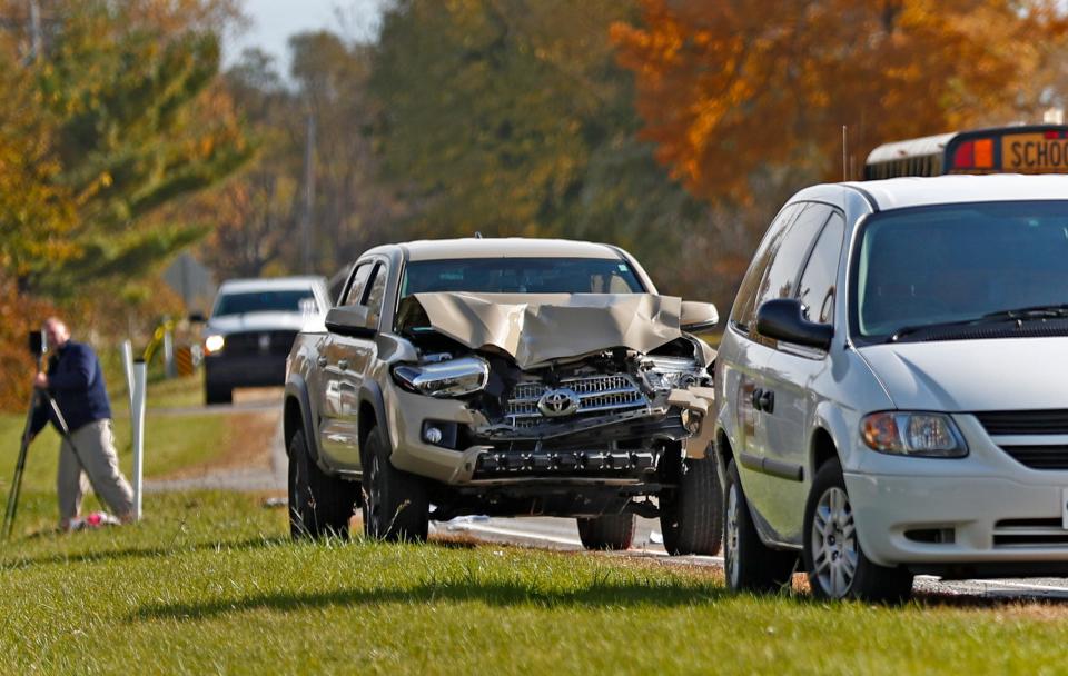 The scene is investigated on State Rd. 25 in Rochester, IN, where a pickup truck hit and killed three young children and critically injured a fourth as the children crossed the street to get on a school bus, Tuesday, Oct. 30, 2018.  The bus was stopped with lights and stop indicators in use.