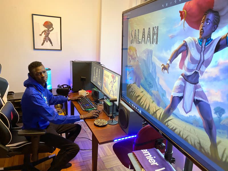 Video game developer Lual Mayen, 25, who learned to code in a refugee camp after fleeing South Sudan, plays his new game at his home in Washington, D.C.
