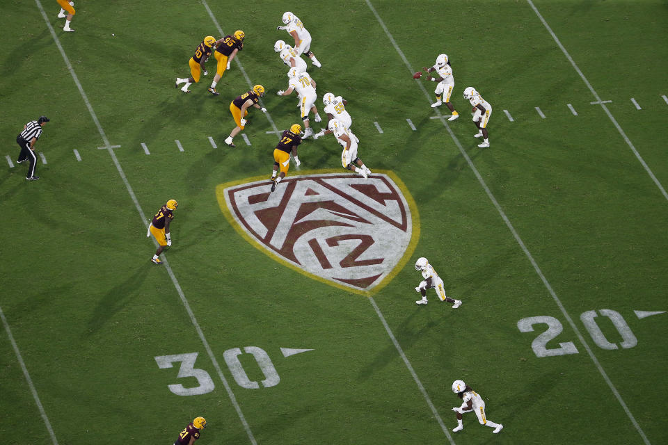 FILE - This Thursday, Aug. 29, 2019, file photo, shows the Pac-12 logo during the second half of an NCAA college football game between Arizona State and Kent State, in Tempe, Ariz. The Pac-12 has become the second major conference to shift to a conference-only fall schedule amid growing concerns over the coronavirus pandemic. (AP Photo/Ralph Freso, File)