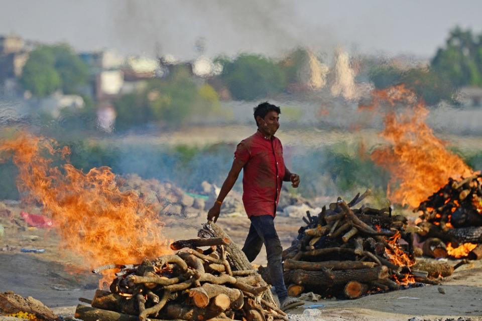 A 76-year-old woman suffering from Covid-19 woke up moments before she was to be cremated at Baramati, India. — AFP pic