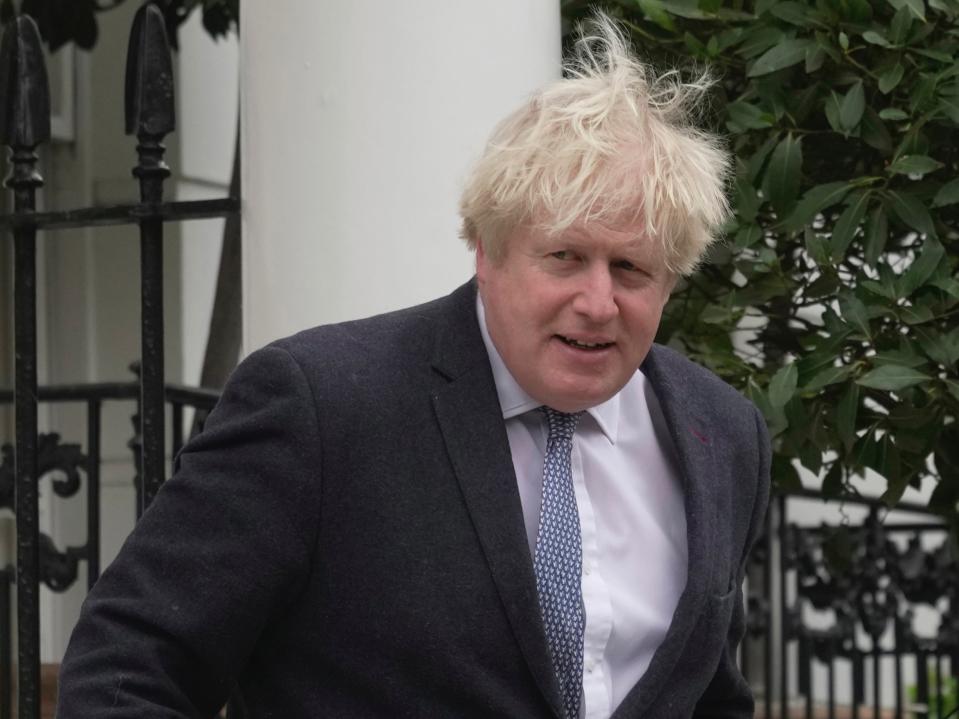 Johnson leaving his London home earlier (AP)