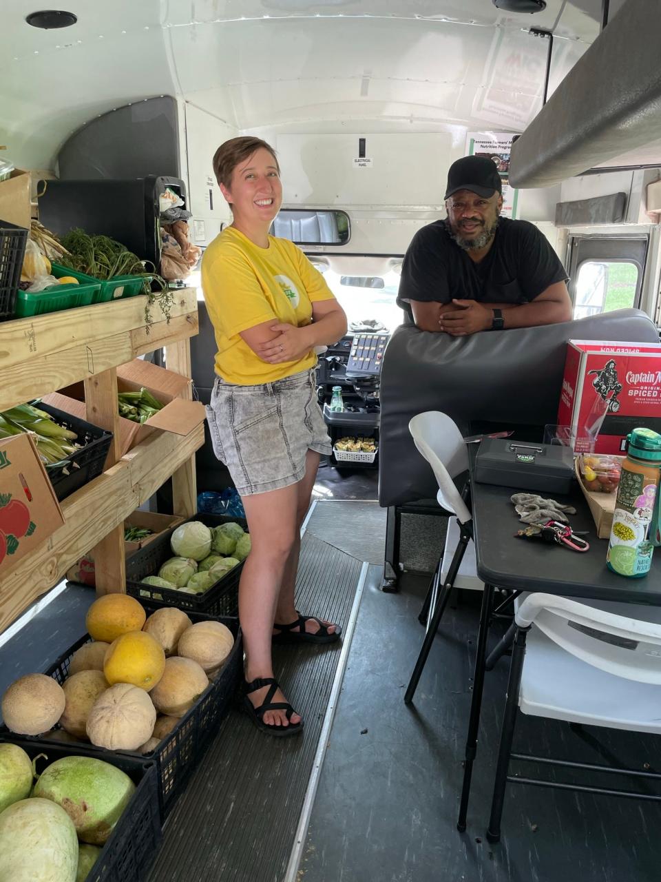 BattleField Farm & Gardens founder Chris Battle and volunteer Kelly Sauskojus in the newly acquired mobile unit, which brings fresh produce to East Knoxville neighborhoods. July 13, 2022