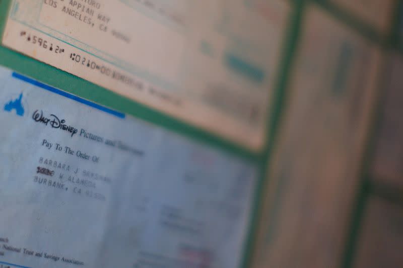 Old residual checks for less than one dollar are framed on a wall inside of the Residuals Tavern at Studio City, in Los Angeles