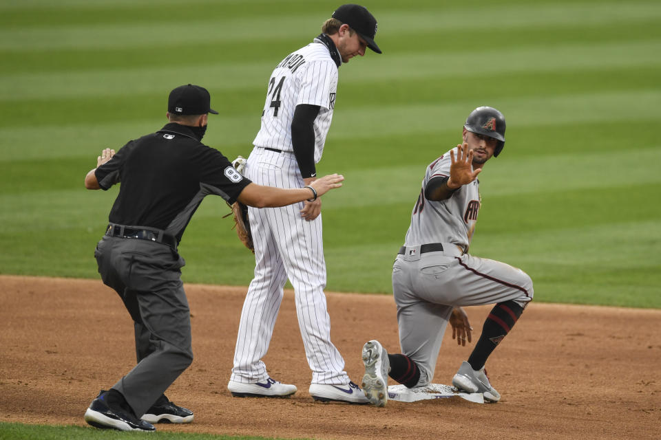 DENVER, CO - AUGUST 11: Tim Locastro (16) of the Arizona Diamondbacks is called safe as Ryan McMahon (24) of the Colorado Rockies covers him after a double at Coors Field on Tuesday, August 11, 2020. (Photo by AAron Ontiveroz/MediaNews Group/The Denver Post via Getty Images)