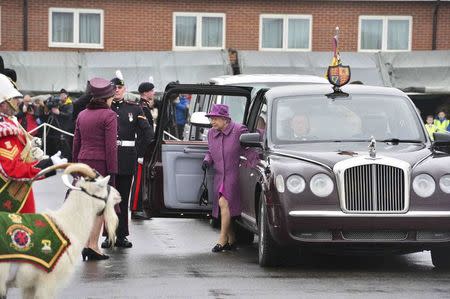 Britain's Queen Elizabeth arrives at Lucknow Barracks to present leeks to soldiers from The Royal Welsh Regiment to mark St David's Day, in Tidworth, Britain March 3, 2017. REUTERS/Ben Birchall