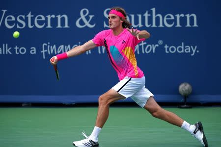 Aug 14, 2018; Mason, OH, USA; Stefanos Tsitsipas (GRE) returns a shot against David Goffin (BEL) in the Western and Southern tennis open at Lindner Family Tennis Center. Aaron Doster-USA TODAY Sports