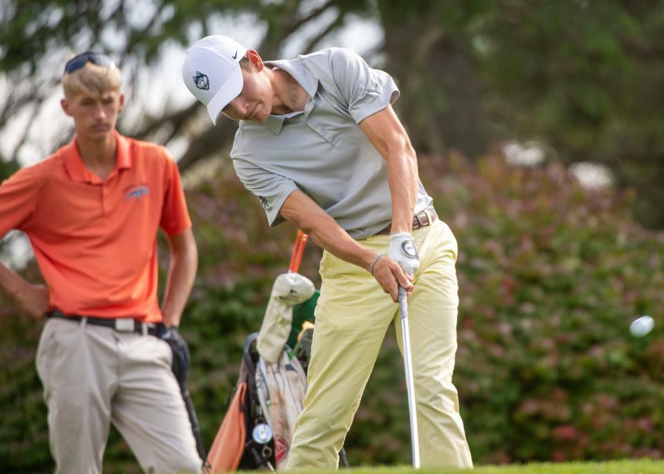 Central York's Dallas Inch watches as Northeastern's Caden Blanchette tees off on their last hole in the YAIAA tournament at Briarwood Golf Club on Thursday, Sept. 28, 2023. Blanchette and Inch were the only players to finish under par in the tournament.