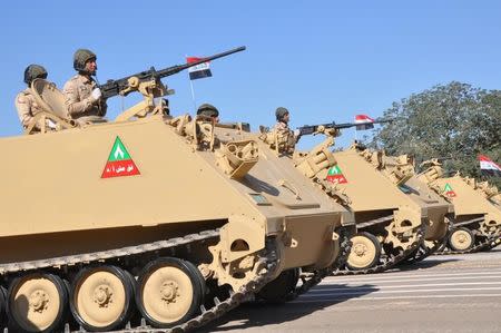 Armored vehicles of Iraqi army are seen during an Iraqi military parade in Baghdad's fortified Green Zone, Iraq December 10, 2017. REUTERS/Stringer