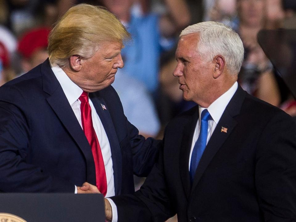 Donald Trump and Mike Pence shake hands