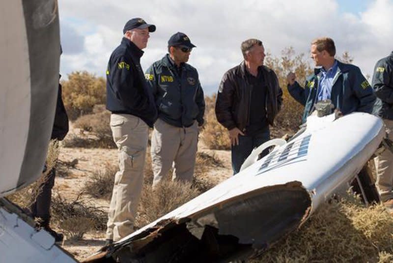 The National Transportation Safety Board investigates the crash site of the Virgin Galactic prototype space tourism rocket in Mojave, Calif., on November 2, 2014, two days after the aircraft crashed. File Photo courtesy of the NTSB